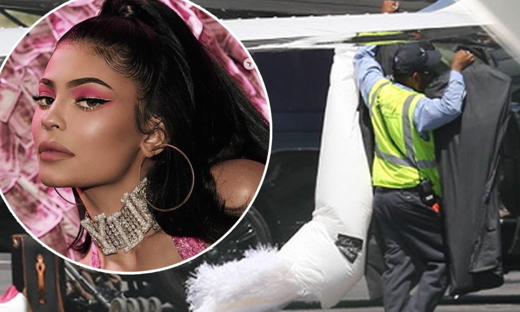 KEEPING UP WITH STORMI’S PARENTS: The Internet Seems to Think Travis Scott & Kylie Jenner Are On Their Way to Get Married As Kylie Boards Plane with Alleged “Wedding Dress” (PHOTOS)