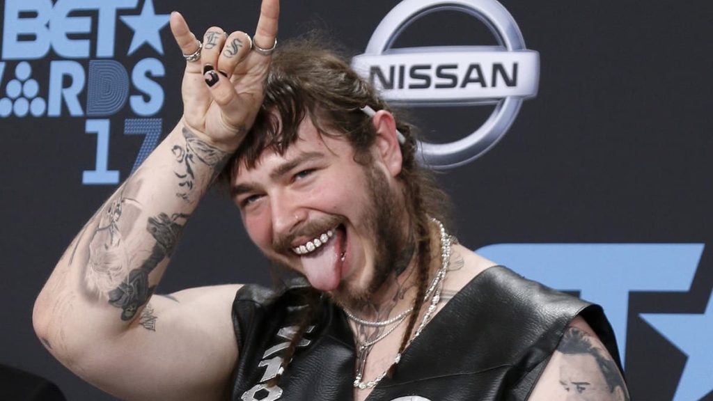 ARE YOU SURE?: Post Malone Responds To Concerns About His Health After Viral Videos of Him Looking a Fool On Stage – “I’m Not On Drugs” (WATCH)