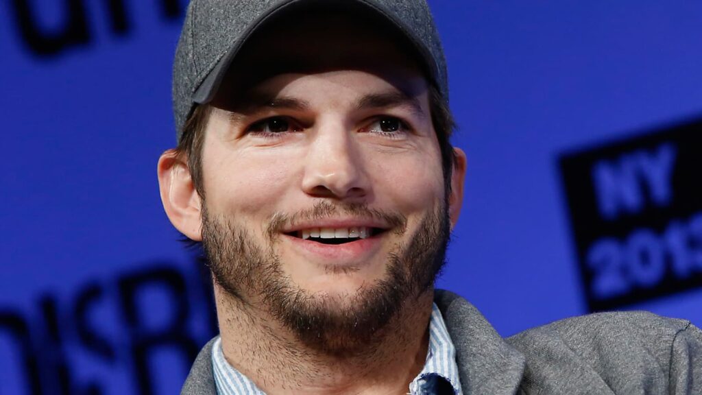 SOMEBODY COME LOOK AT THIS: Ashton Kutcher Met With “Take A Shower!” By Crowd During College Football Game